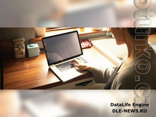 Woman Using Laptop on Kitchen Counter Mockup 220158270