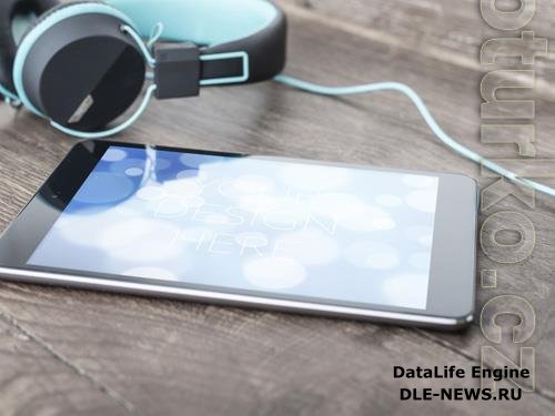 Tablet on Table with Headphones Mockup 215881968