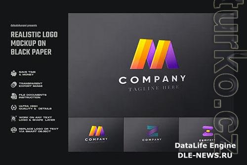 Realistic logo mockup on black pressed paper PSD